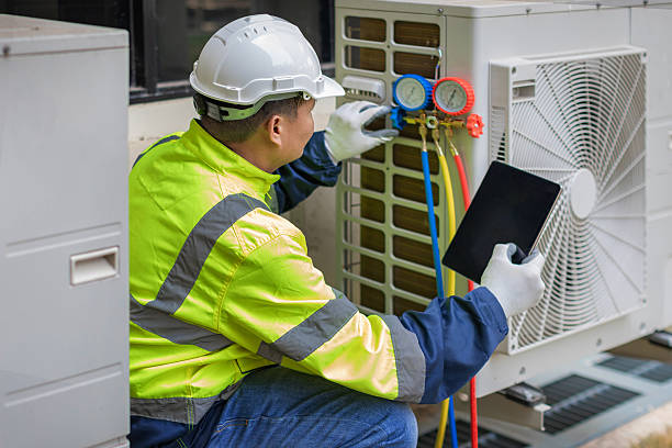 Professional Hvac Maintenance technician working in Manson, WA
